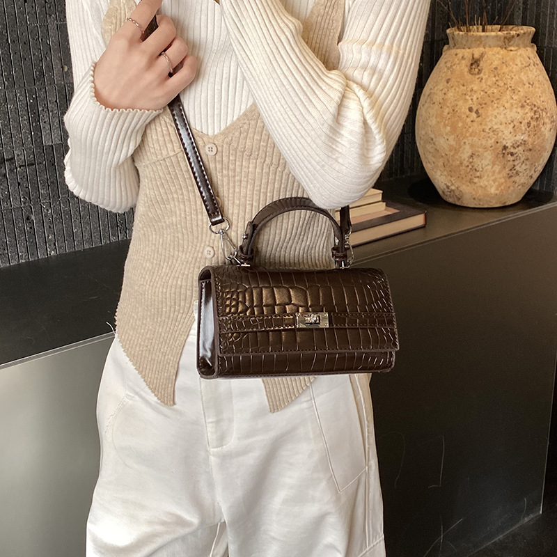 Sentimiento diario de cocodrilo Kelly bolso para mujeres 2026 nuevo diseño de nicho retro bolso de mano de viaje mochila de hombro