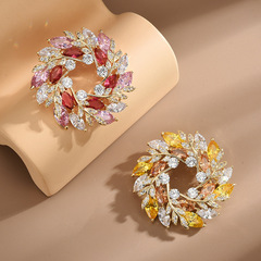 Elegant floral brooch with high-end, niche, and fashionable design, featuring zirconia flowers, perfect for high-quality clothing and accessories, embodying a refined and creative style for women.