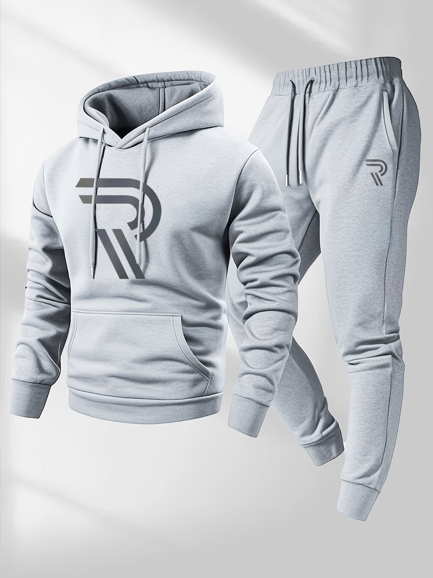 Cross-border nuevo estilo casual de moda para hombres y mujeres suéter impresa sudadera y trajes deportivos de cuerda de tracción Europa y América