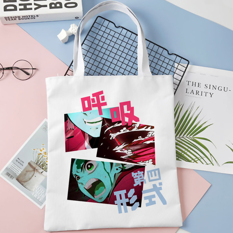 Comercio exterior transfronterizo Demon Slayer impresa bolsa de lona Harjuku bolsa de hombro bolsa de compras portátil de moda para estudiantes