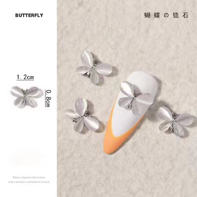 Accesorios de uñas Opal Mariposa nueva flor de lujo ligero Aleación de diamantes accesorios pegatinas de uñas decoración de diamantes de imitación al por mayor