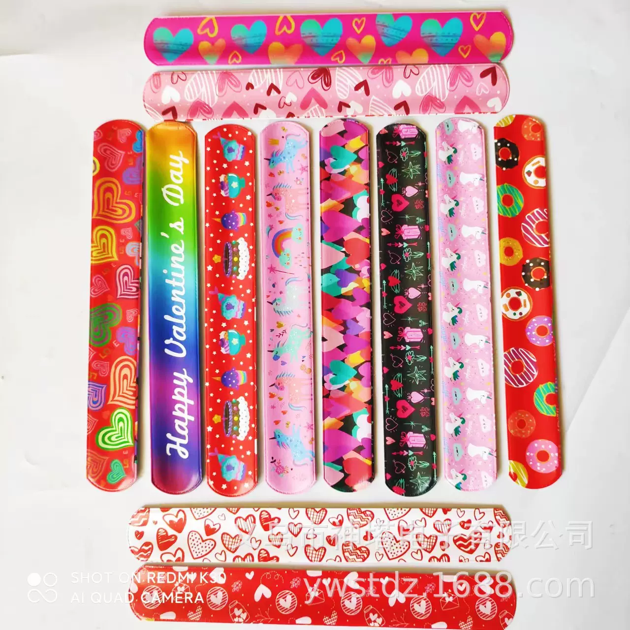 亚马逊货源无侵权图案现货情人节款啪啪圈饰品配件手腕带手环