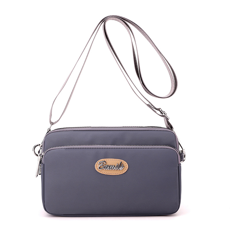 2025 nuevo estilo coreano moda transfronteriza todo fósforo Oxford tela bandolera bolso pequeño ligero casual de hombro para mujer