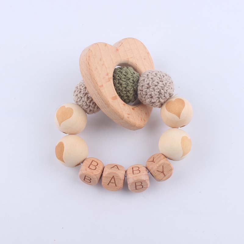 Bebé suministros de dibujos animados de haya amor mordedor creativo DIY dibujos animados amor patrón mordedura pulsera teether juguete