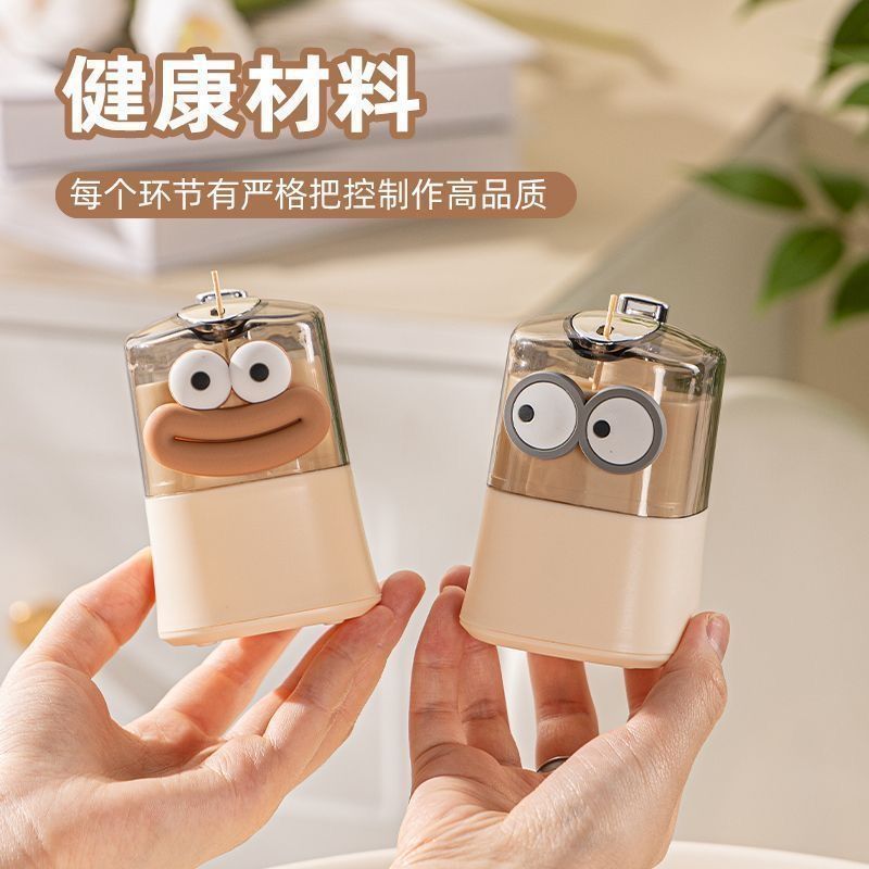 Caja de palillos de dientes doméstica de alto valor facial, caja de palillos de dientes de escritorio de la sala de estar de presión, creatividad de dibujos animados de palillos de dientes emergentes automáticamente