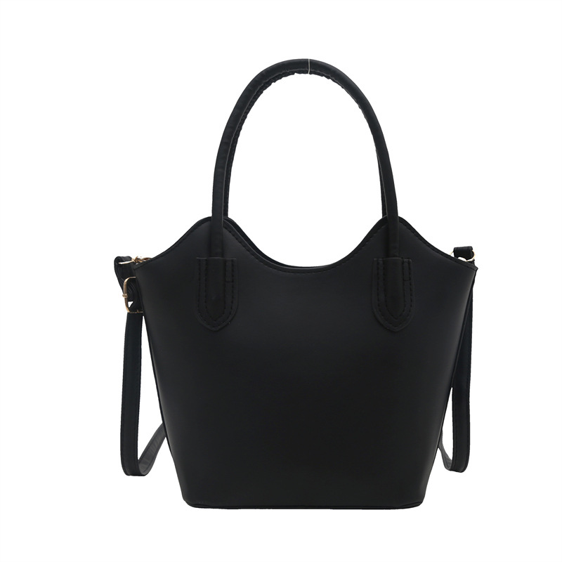 Este año, bolsos populares vintage para mujeres otoño y invierno 025 nuevo bolso de mochila de nicho de diseño de bolso de cubo de viaje portátil