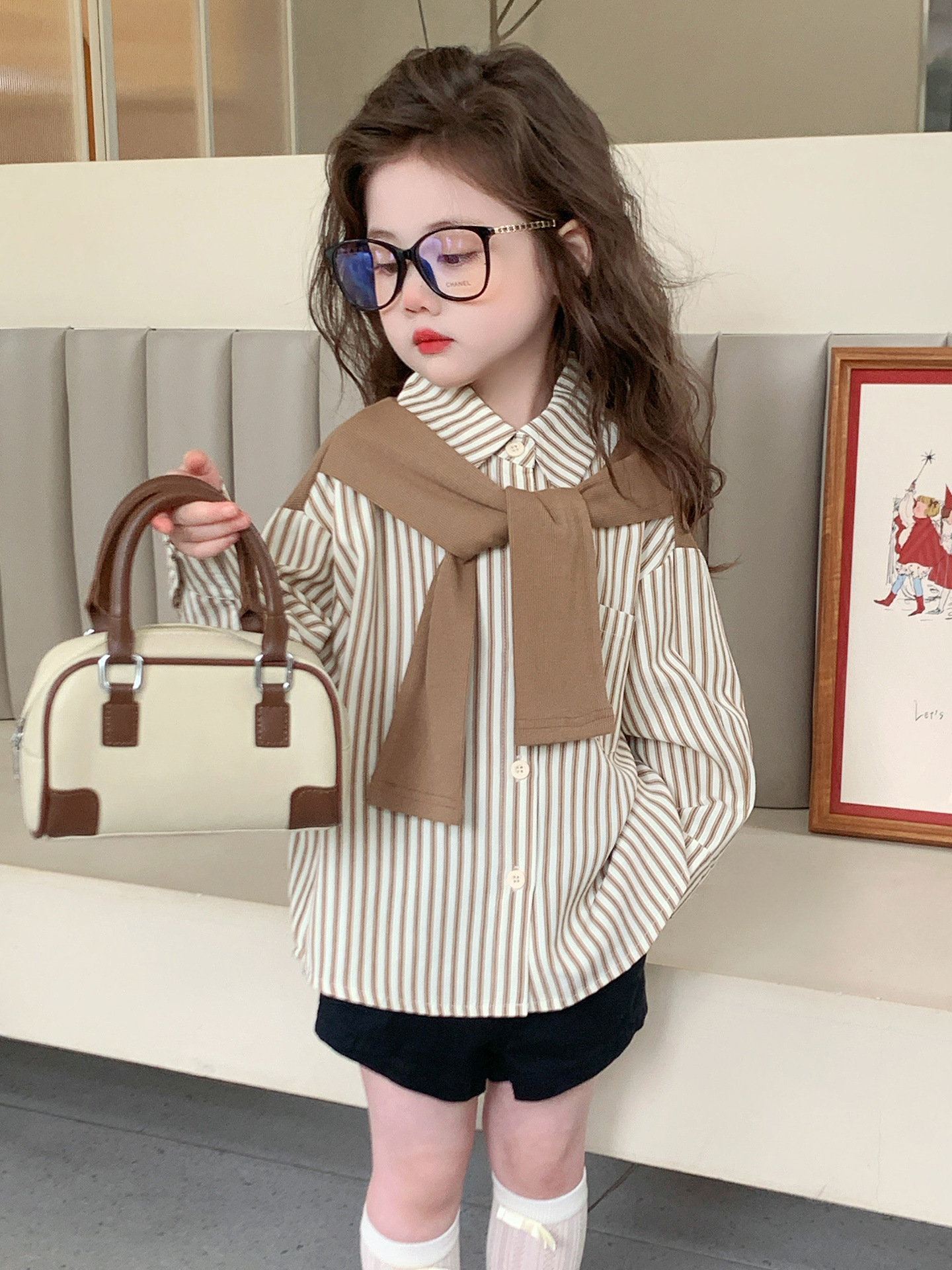 Camisas de chal de rayas de primavera y otoño 2025 nuevas camisas de manga larga de otoño de bebés femeninas