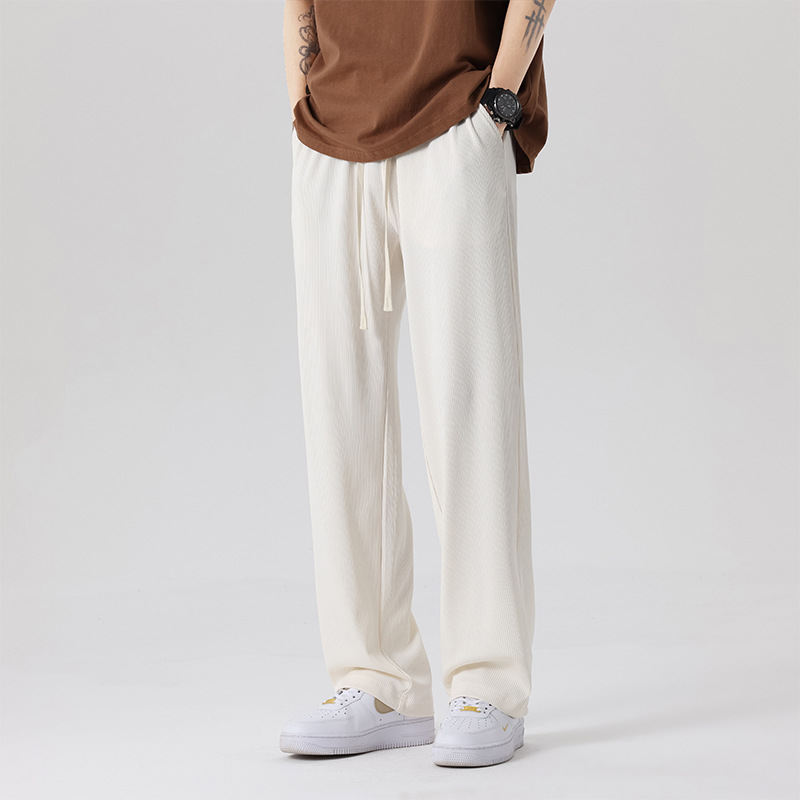 Spring and summer new ice silk casual pants men's tide brand thin sports pants black loose toe nine long pants
