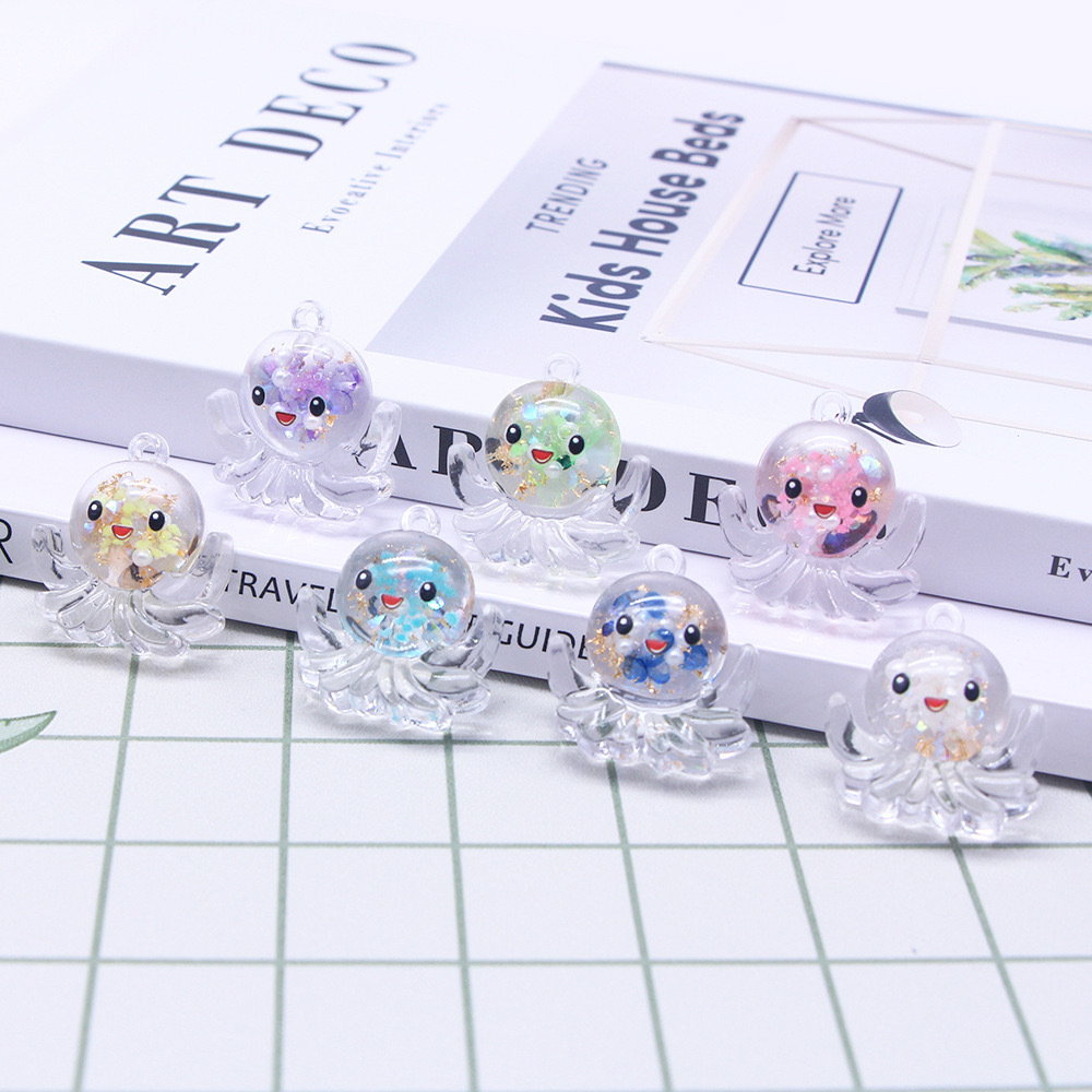 Nuevos accesorios de pulpo nocturno marino serie de cristal octopus llavero colgante DIY material pendiente