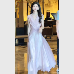 夏の美しいロングスカート、富の娘、フレンチヘップバーンスタイルのピンクのノースリーブツイストドレス