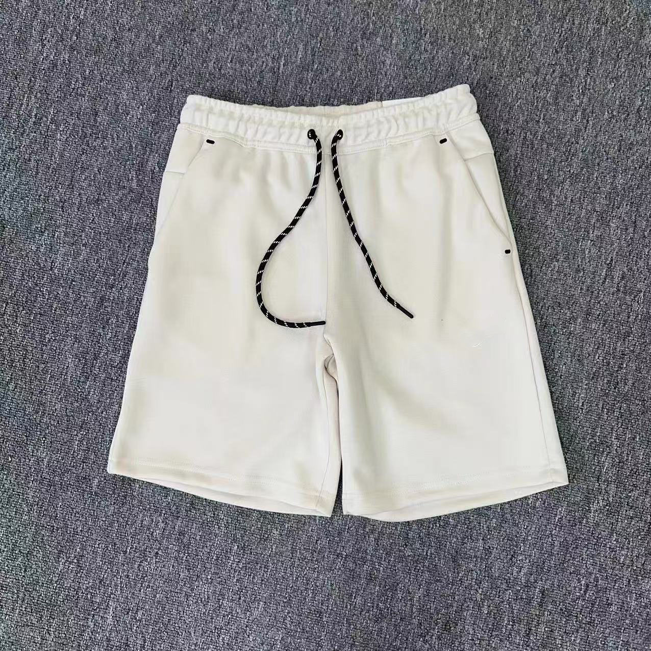 20ss cross-border N 4503 multicolor nuevo letras impresión de bolsillo de bolsillo pantalones cortos deportivos para hombres y mujeres