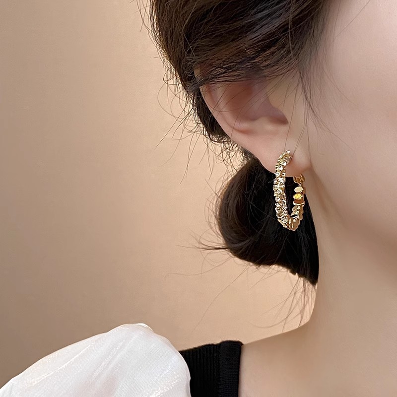 2025 nuevo estilo círculo de moda hebilla de oreja de plata rota cobre chapado en oro real pendientes elegantes de moda pendientes de lujo ligero de alta gama
