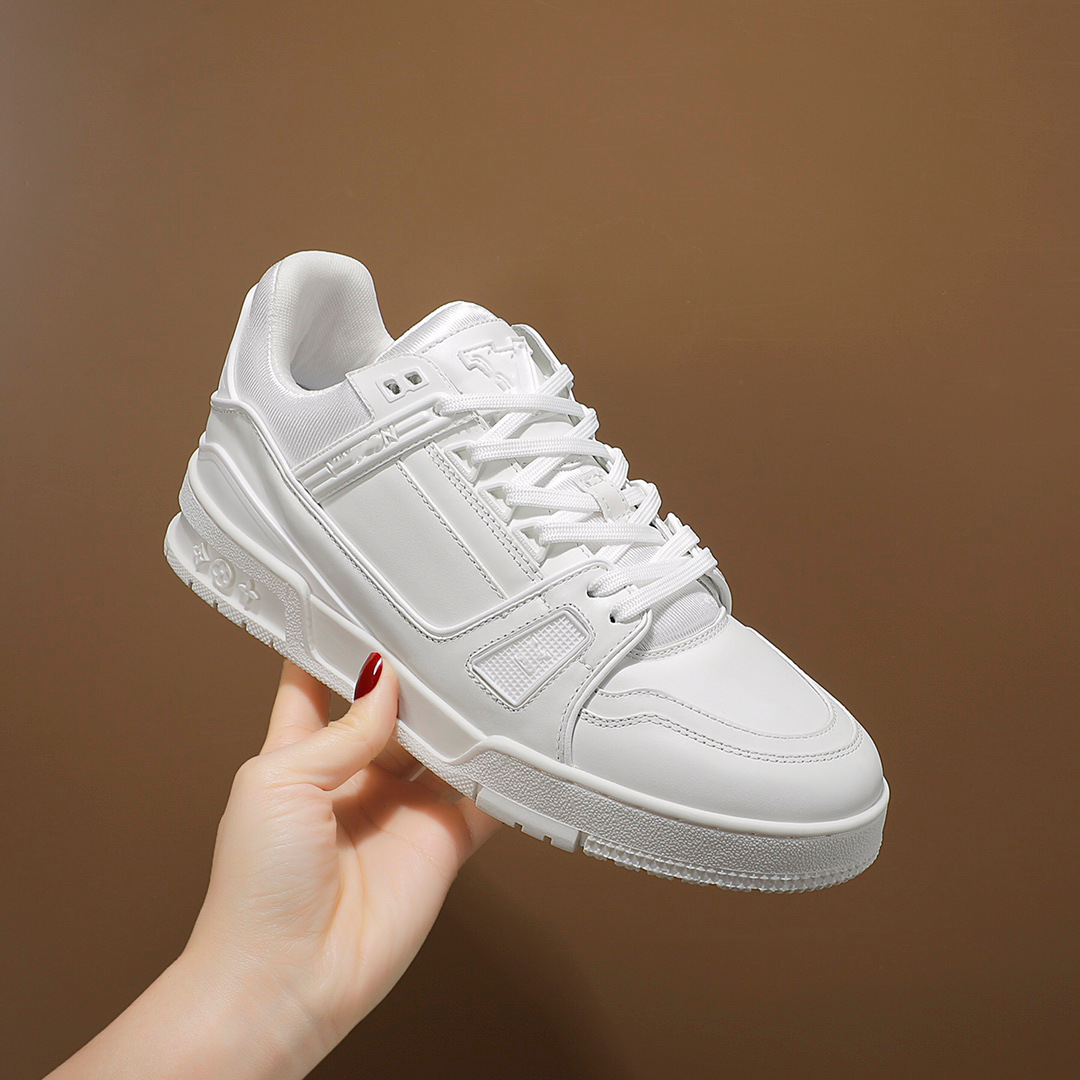 Zapatos de moda europeos Guangzhou de alta versión驴 entrenador zapatos deportivos ociosos de cuero universal para hombres y mujeres