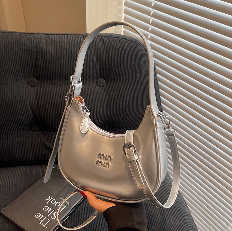 Bolsos de axila de nicho de moda para mujer 2025 nuevo bolso de bola de masa de cercanías con textura versátil, bolso de hombro de alta gama