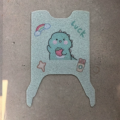 looks up at AB65 electric: Electric vehicle foot mat - strawberry-dinosaur-emma-looking-up-at-ab65
