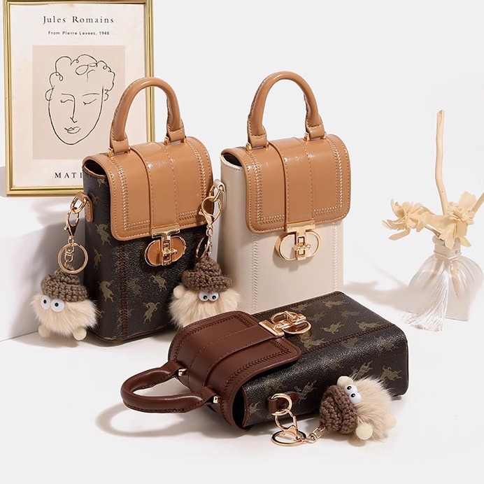 Otoño y invierno mini bolso de mujer 2026 nuevo nicho de hombro pequeño bolso de hombro de alto nivel bolso de mano pequeño bolso de teléfono móvil