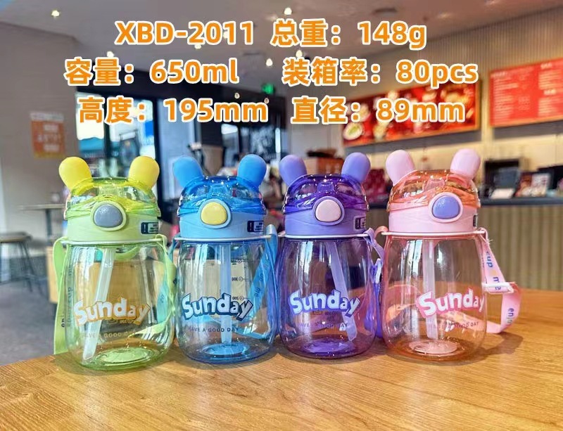 Xinbeidi 2010 taza de agua de plástico para niños correa de paja taza de plástico diversión Orejas de conejo taza de plástico taza de agua para estudiantes