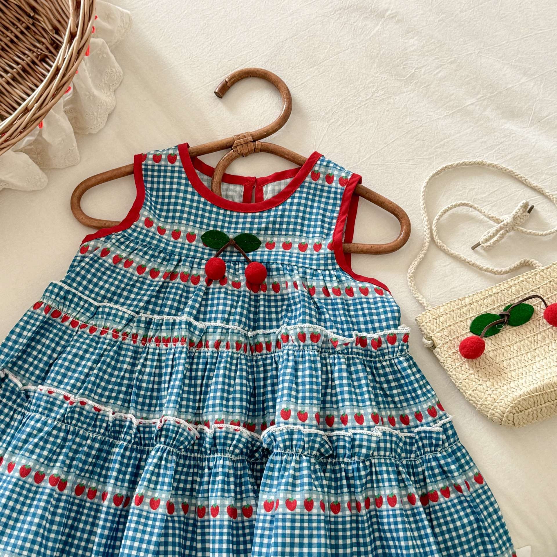 Xianning siete ropa para niños verano nuevo estilo niña dulce azul a cuadros vestido sin mangas falda chaleco de cereza de bebé femenino