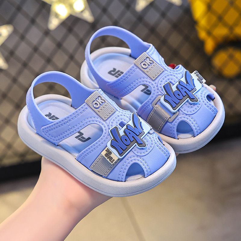 Sandalias para bebés varones de verano nuevas zapatos de playa transpirables de dedos abiertos zapatos para bebés con suela suave antideslizante.
