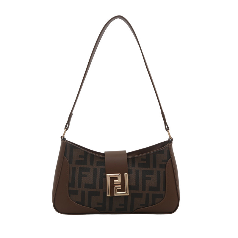 Bolsa de mitad de mes caliente 2025 nueva mujer color transfronterizo bolso de hombro brazalete de alto nivel nicho bolso de diseño