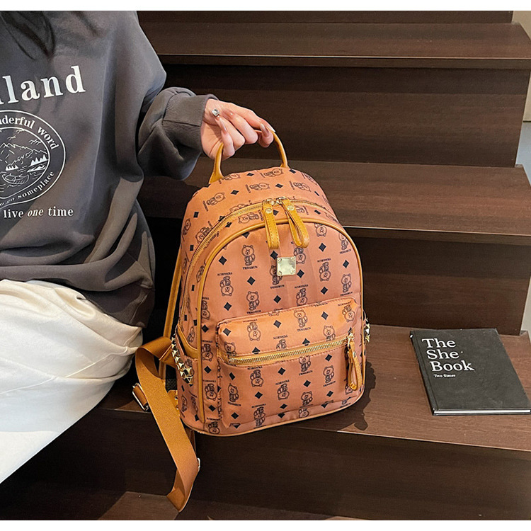 A cute little bear backpack for female college students in 2025, a new fashionable and trendy backpack with a large capacity undefined