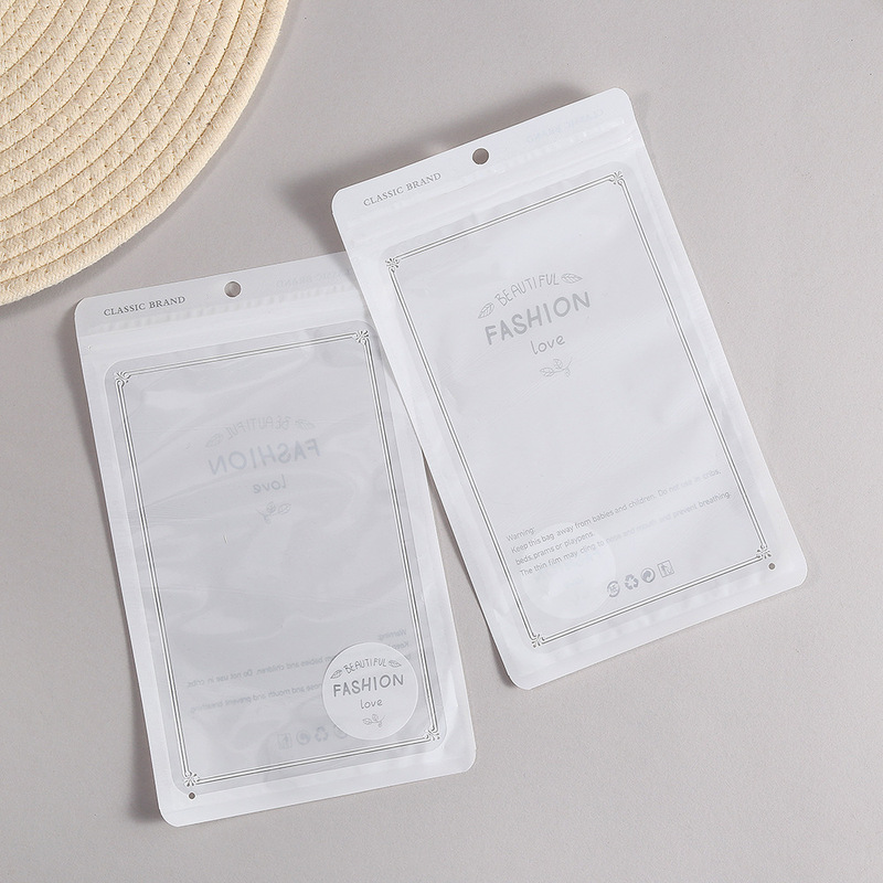 PEプラスチック製の自封袋、厚手の透明な靴下用汎用包装袋、キリンの漫画柄衣類袋、越境向け|undefined