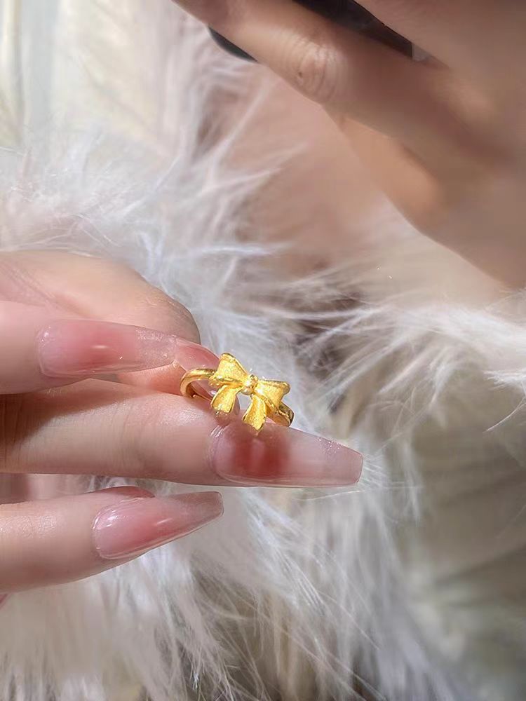 Ny båge ring guld butik samma stil Princess serie lös ring kvinnors matchande elegant armband_voghion.com