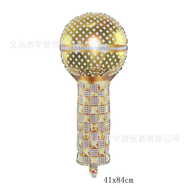 Big small golden microphone