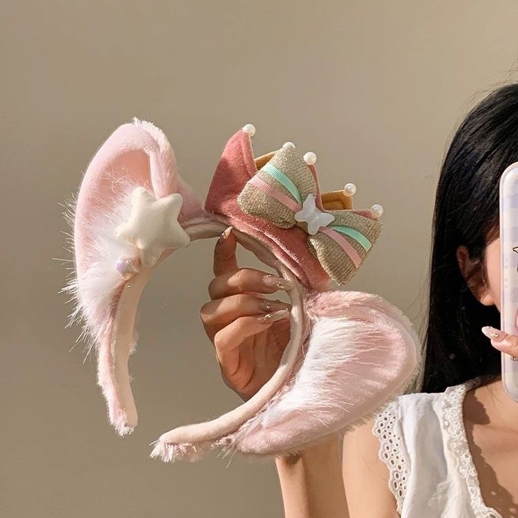 ピンクの蝶結びのベルの毛の耳のカチューシャの女性の高い頭の上のカチューシャは写真を撮って顔を洗って髪を押さえます。|undefined