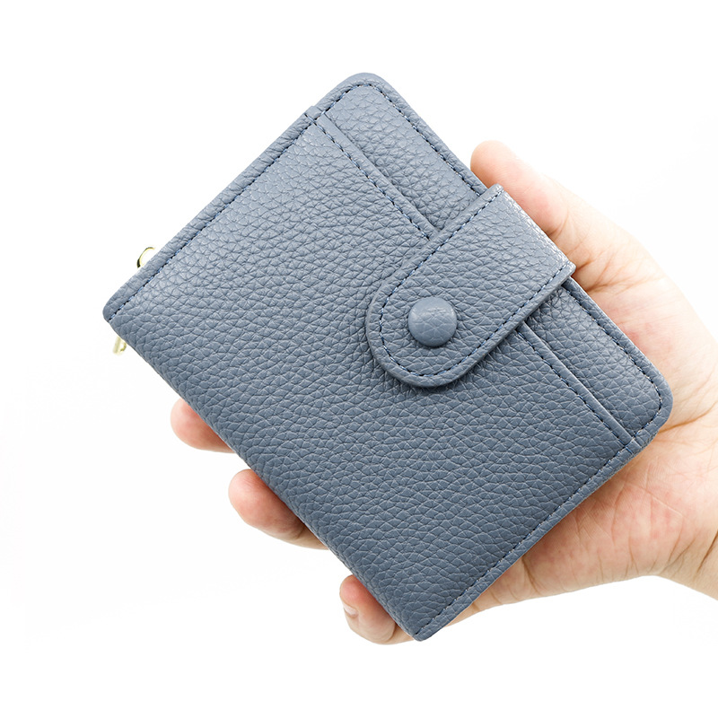 Nueva cartera transfronteriza de las mujeres simple patrón lychee cremallera monedero corto chica cartera al por mayor