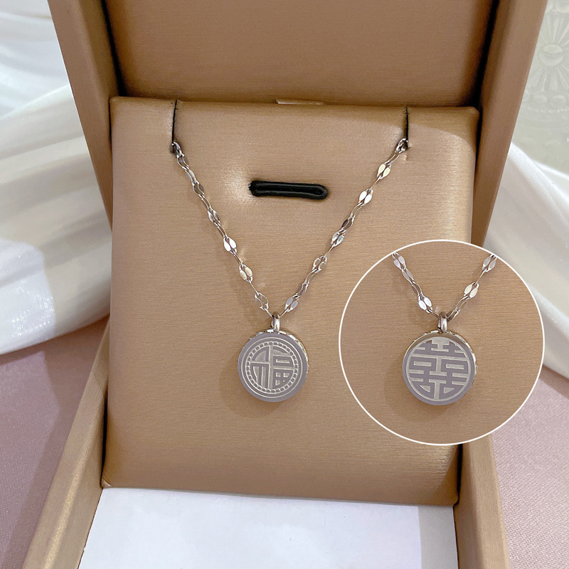Collier femme symbole fu double face en or véritable bijoux_voghion.com