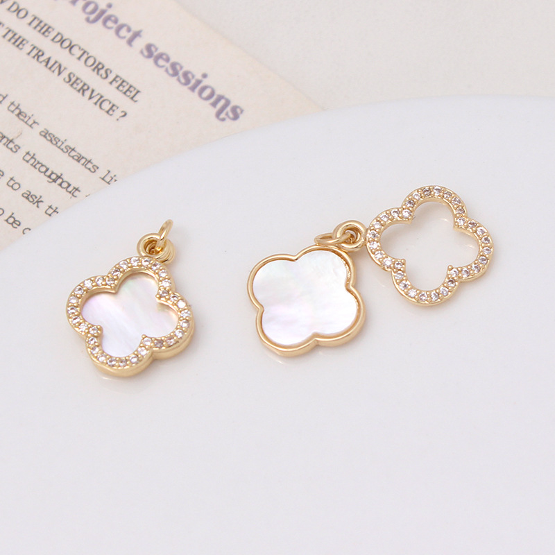 保色メッキ真金insは天然貝殻月の雲をはめ込んでいます。