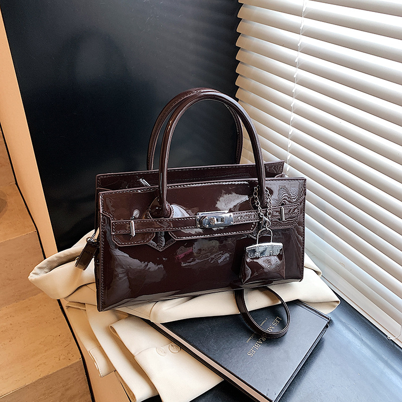 Bolso de brazo de la sensación cotidiana para mujeres 2026 nuevo nicho coreano bolso especial, moda casual, bolso de hombro universal
