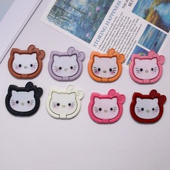 国境を越えたアニメかわいいkt猫の指環は回転可能なスタンドの背貼り式金属の純色の蝶結びの携帯電話スタンドを固定します。