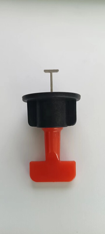 タイルのレベリング器のタイルのレベリング器の台座にタイルを挿します。|undefined
