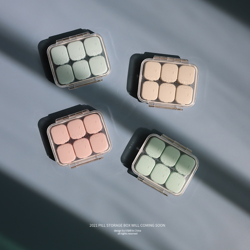 Creative multi-compartment storage box can be assembled into a sealed pill box that changes from four compartments to six compartments for a week, simple portable packaging box