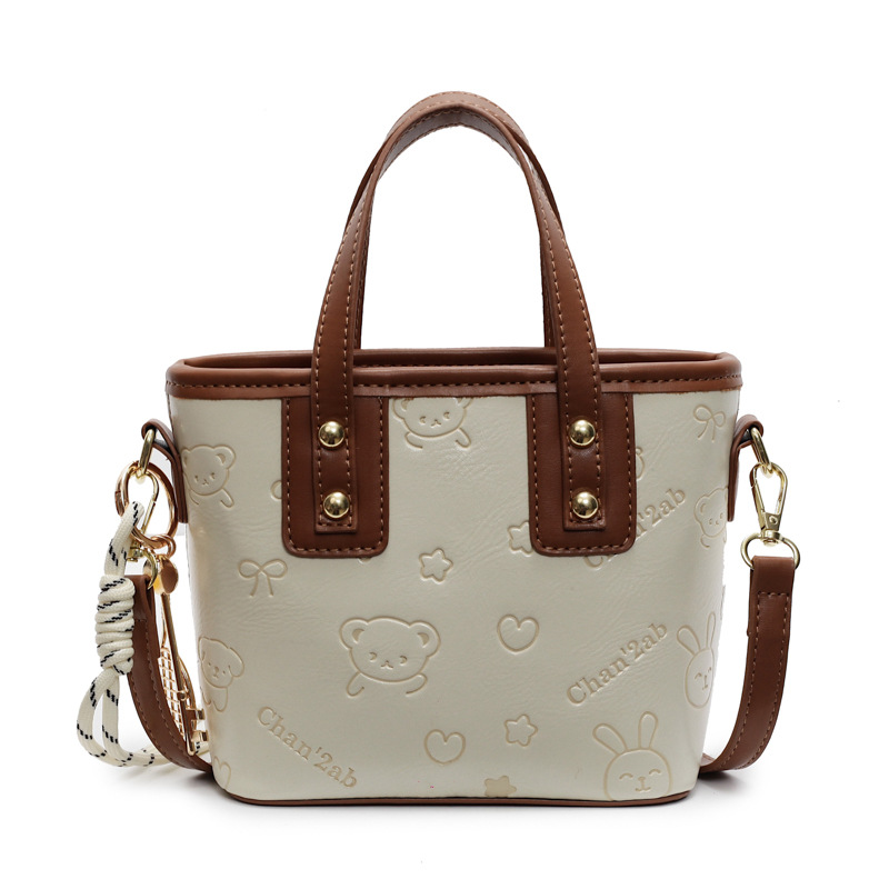 Bolsa de cubo para mujeres 2025 nueva moda versátil bolso de hombro de mano de alta calidad nicho de diseño de mochila de mujer