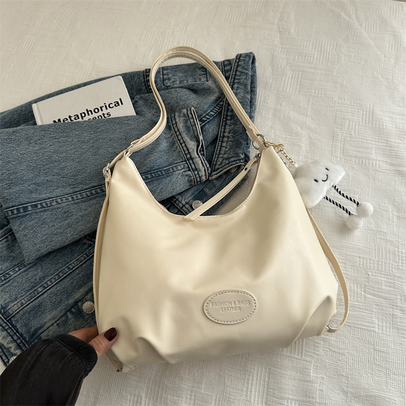 Mochila de moda coreana de invierno para mujeres 2024 nueva mochila de hombro simple de gran capacidad para mujeres