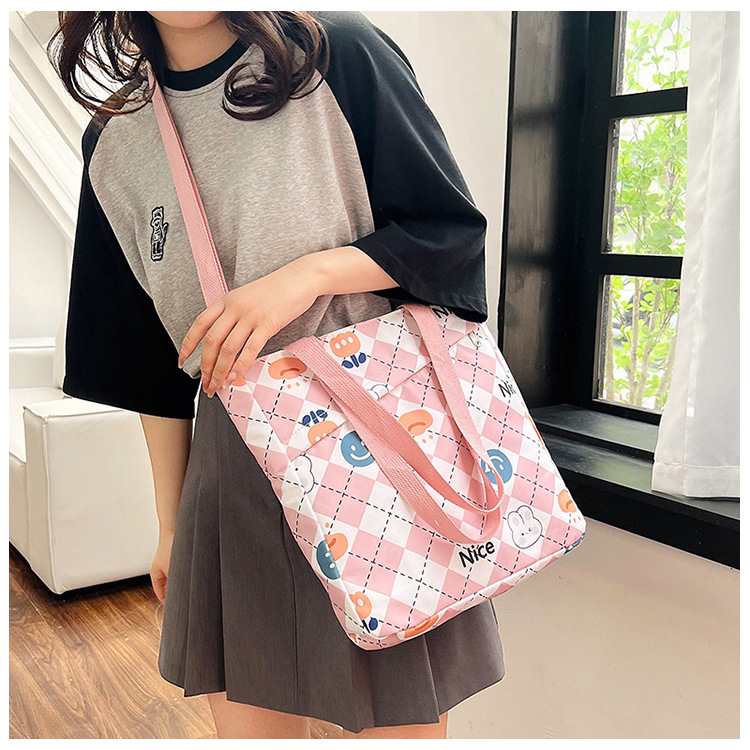 New nylon large-capacity hand-held student storage bag, cute cartoon outdoor bento bag, high appearance level single-shoulder women's bag undefined
