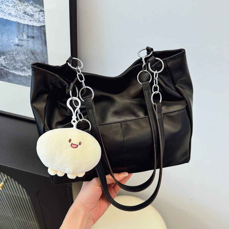Alta sensación de bolso grande para mujeres 2024 nueva moda de verano de moda de gran capacidad de transporte bolsa bolsa de hombro de textura de mujer