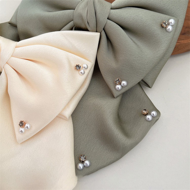 Women's Simple Style Bow Knot Cloth Rhinestones Pearl Hair Clip display picture 4