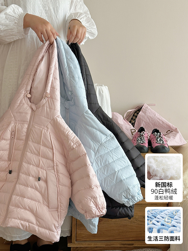 Xie Jinmao chaqueta de plumón de alta gama 2025 invierno niñas nuevas niñas DuPont tres defenses 90 chaqueta de plumón blanco