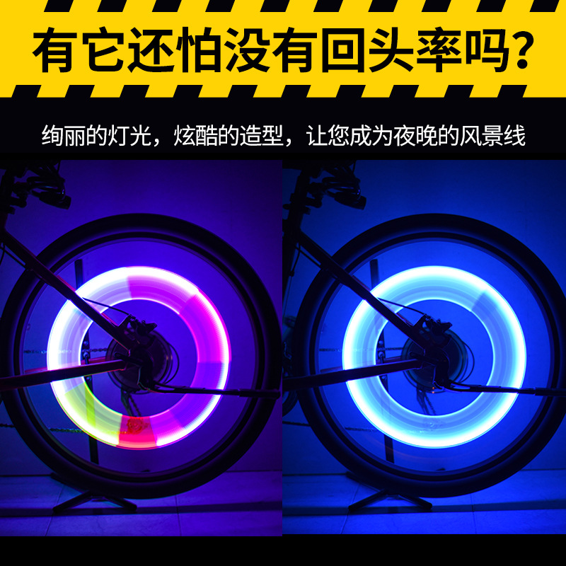 Lámpara de válvula de bicicleta de montaña alargada rueda de luz colorida rueda caliente luz flash de advertencia de montaña de noche