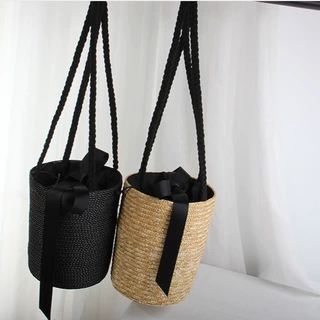 2024新款蝴蝶结编织包可爱麦草水桶包单肩草编包度假风沙滩包女包