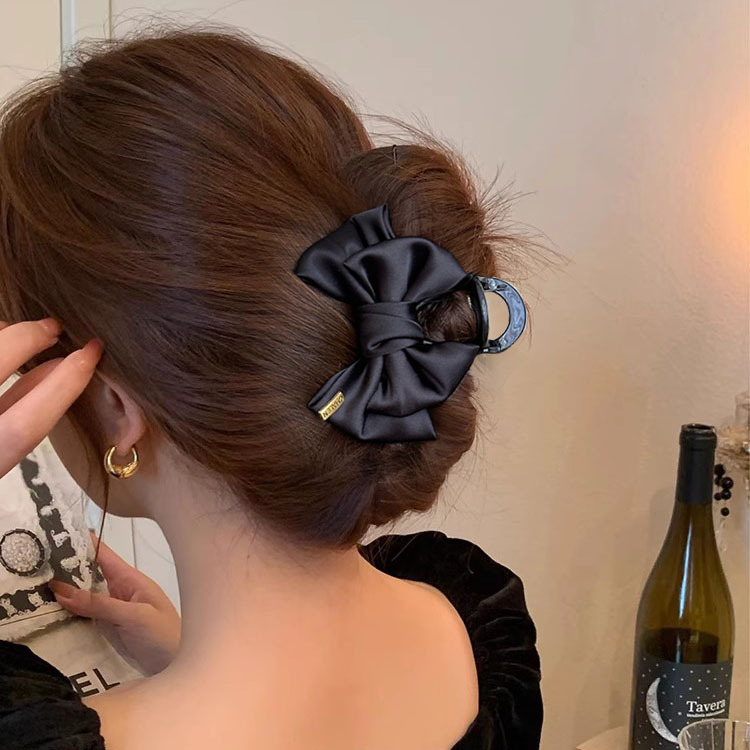 Oro negro etiqueta abrazadera de arco para mujeres nuevo estilo de alta sensibilidad abrazadera de cabello detrás del cerebro abrazadera de cabello de pesca abrazadera de cabello