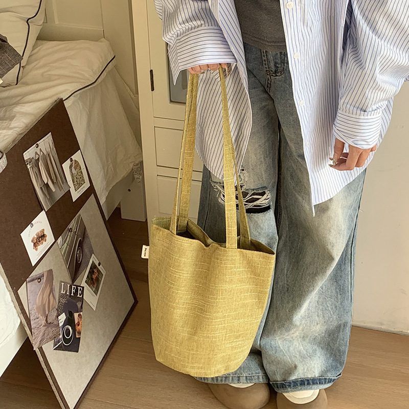 Bolso de mujer nuevo cubo de hombro material de lana versátil textura de ocio bolso de mano de viaje bolsa de tela de gran capacidad mochila