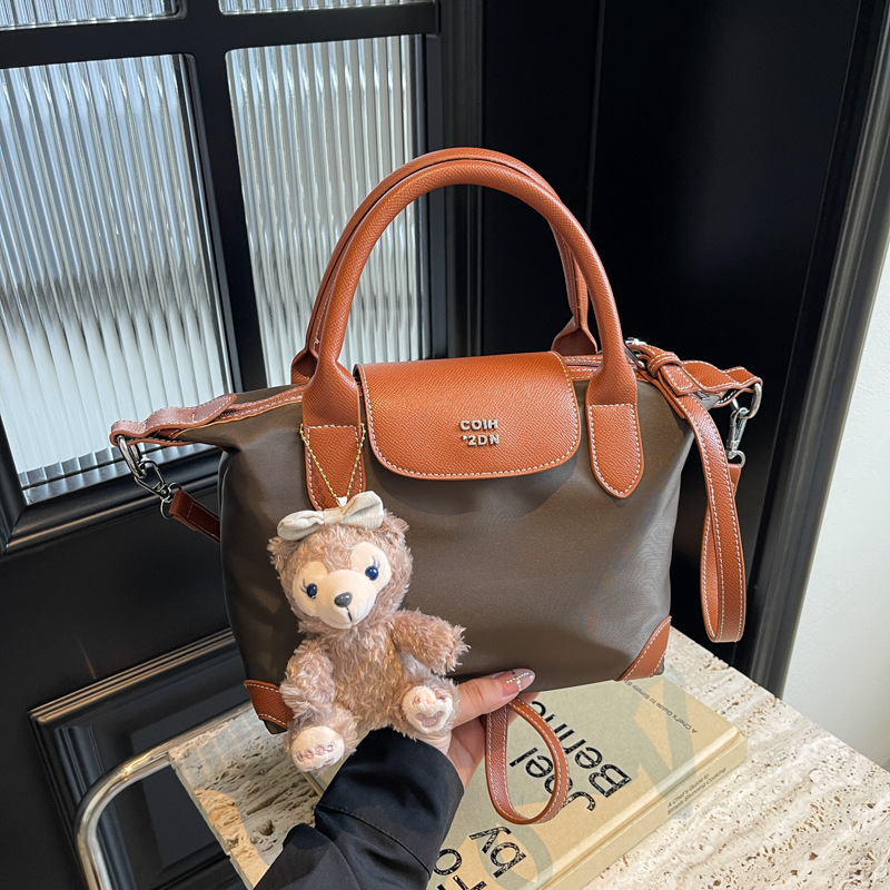 Nylon color contrastante empalme bolso de bolsillo portátil mujer 2024 nuevo estilo transfronterizo de alta calidad exquisita mochila de hombro