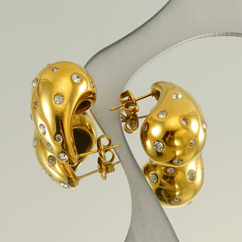 Diseño de alta gama sentido 18K oro gordito gota de agua pendientes de acero de titanio INS moda femenina todo partido pendientes geométricos al por mayor