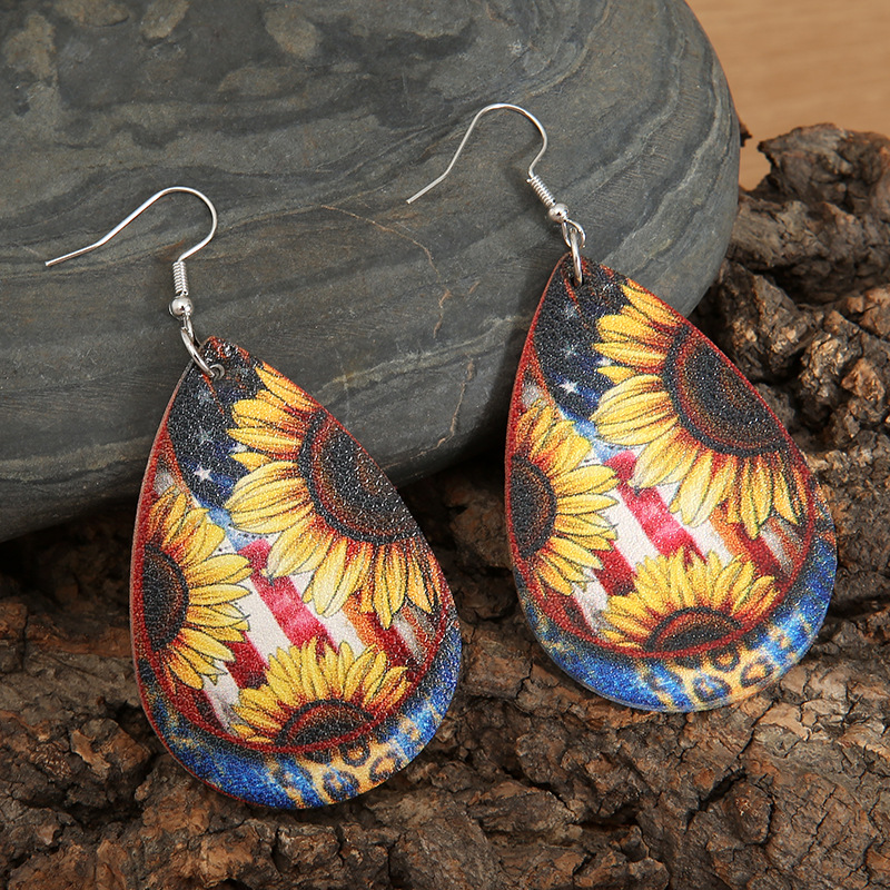 New Drop-shaped Retro Sunflower Leather Lychee Pattern Pu Earrings Metal display picture 3