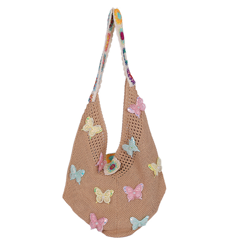 Versión coreana del bolso de nicho 2025 verano nuevo bolso femenino mariposa bolso tejido bolso de hombro de punto de gran capacidad